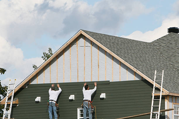 Professional Siding Installation technician working in Shacklefords, VA